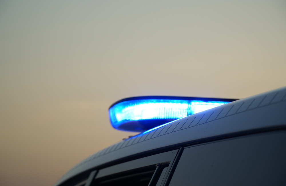 Archief_112_Politie lichtbalk zonsondergang AAN.JPG